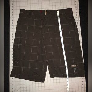 O’Neill 23” Plaid Shorts. Size 34. Brown color.